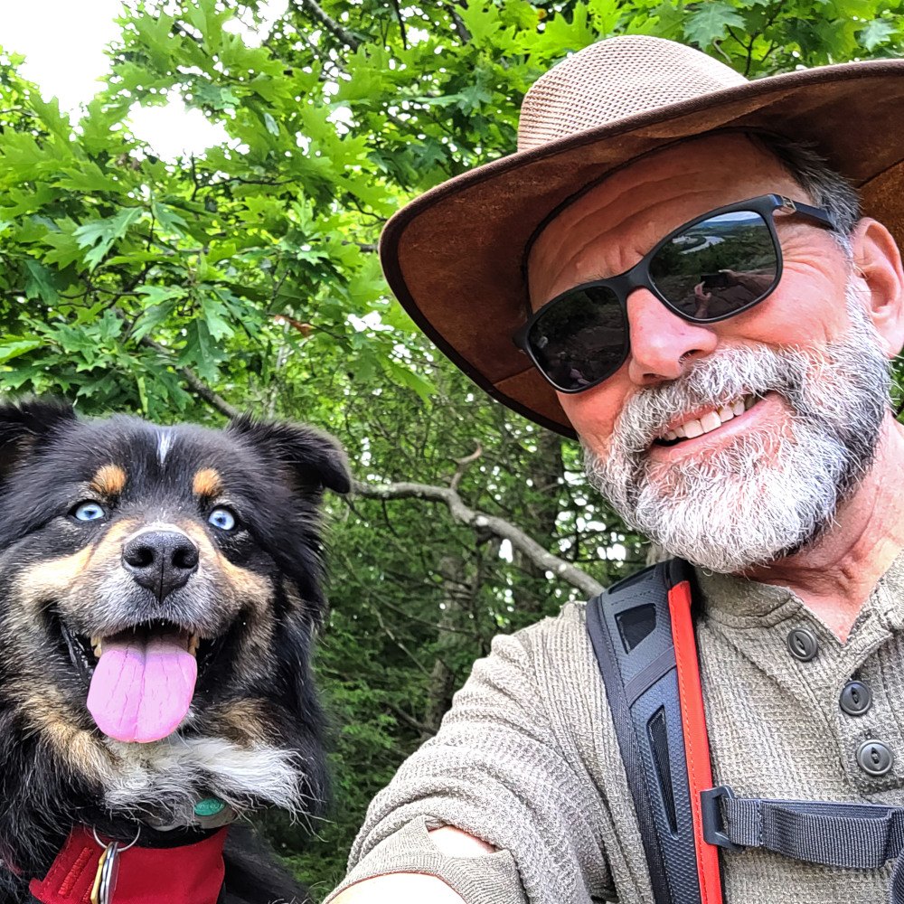 Peter Pelland with his Australian Shepherd